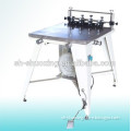 Screen printing table with peripheral pump